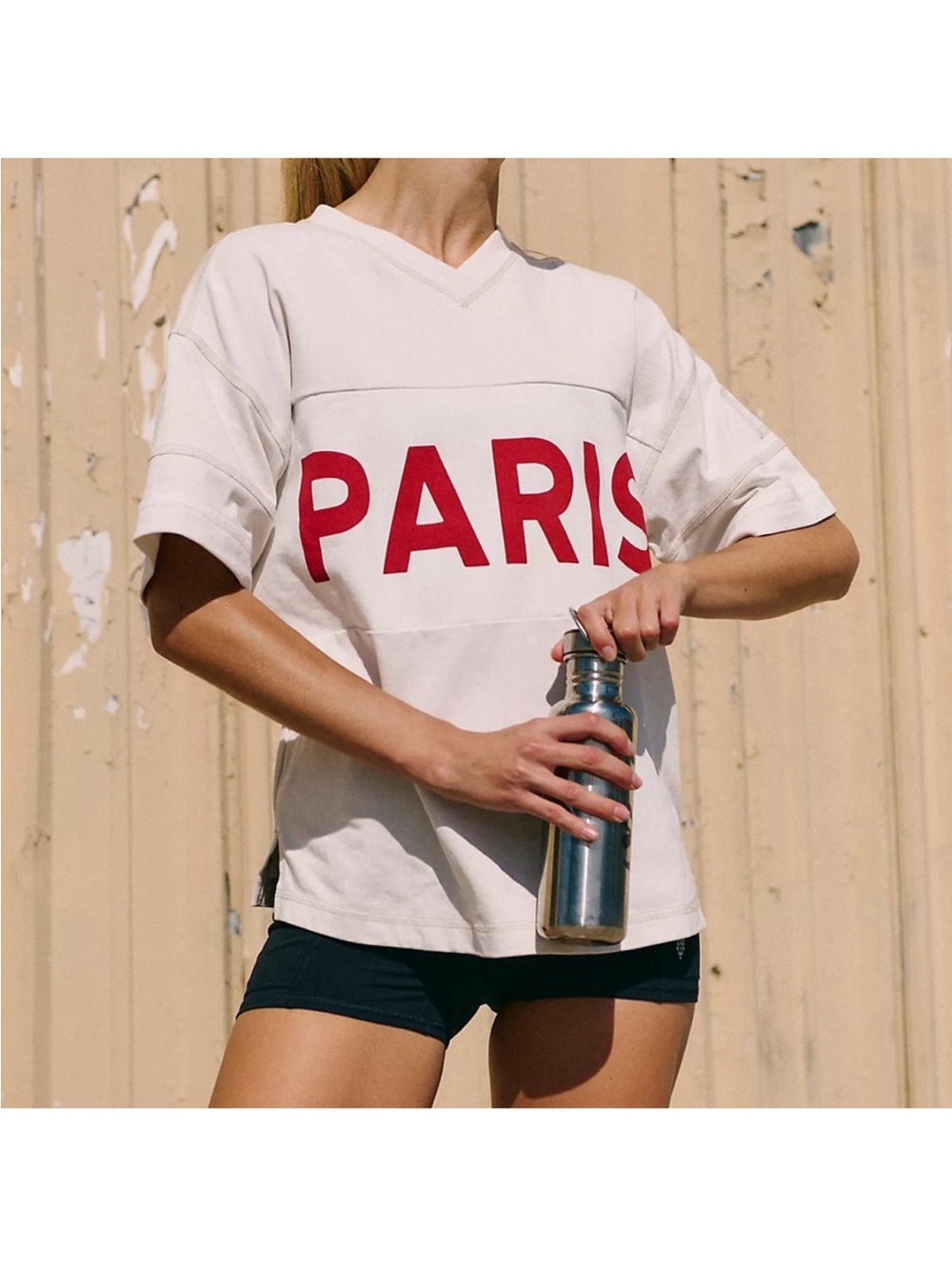 Free People PARIS Graphic V‑Neck Short Sleeve Tee — Cream with Red Logo